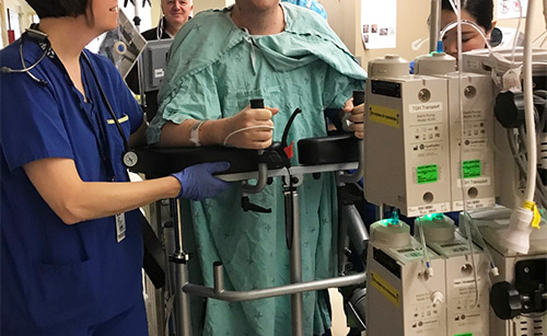 Darko with medical team member and machines