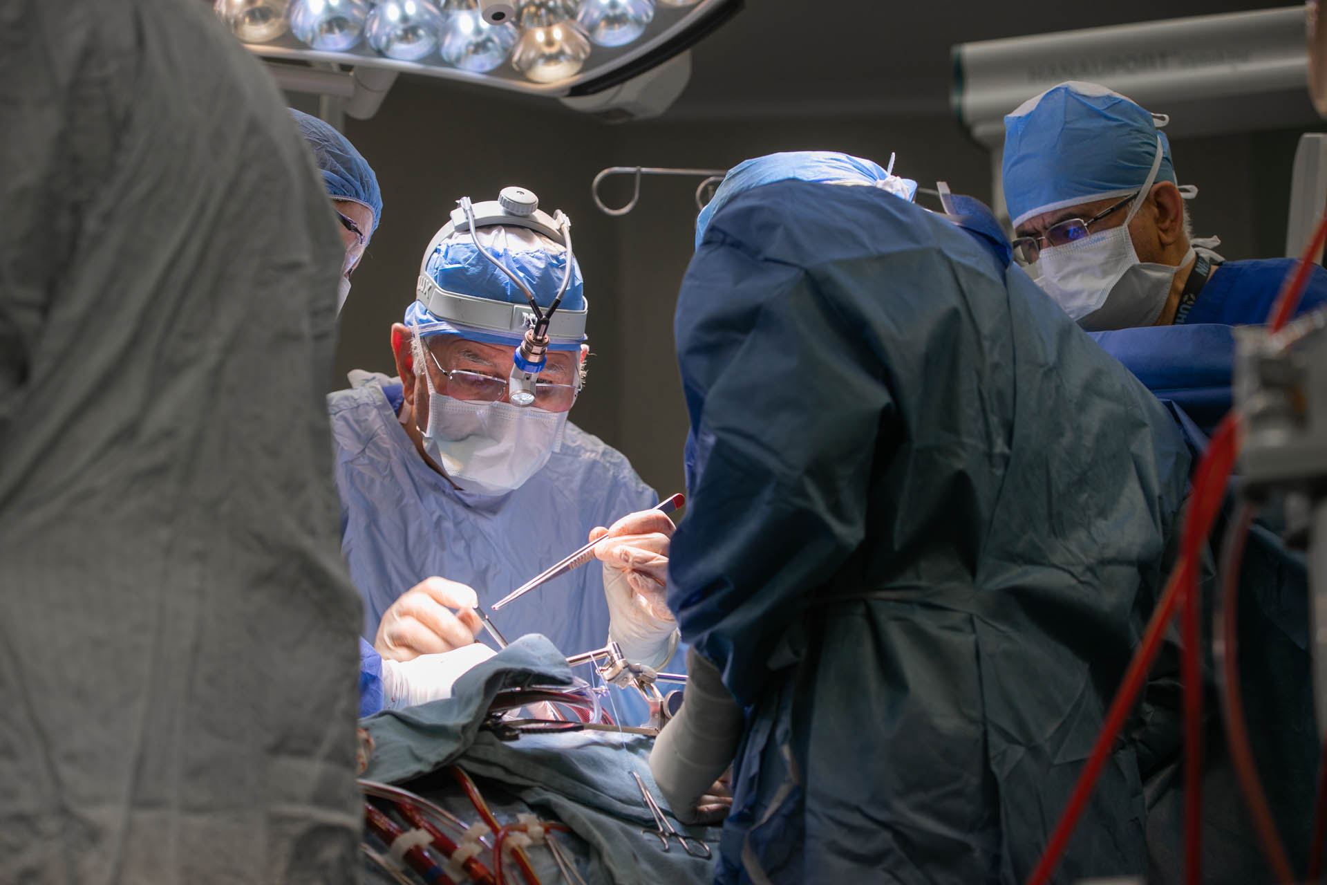 Surgeons performing an operation.
