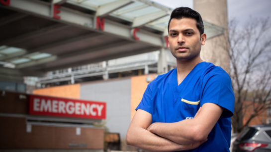 UHN’s Virtual Emergency Department cuts down wait times for urgent care (image: Sameer Masood standing in front of Emergency Department)