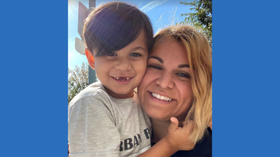 Veronica Deally with her son, Dylan, both smiling and taking a selfie.