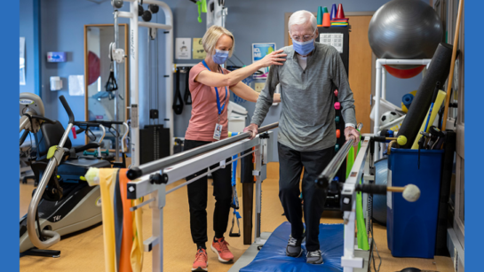 Physiotherapy Assistant helping a patient