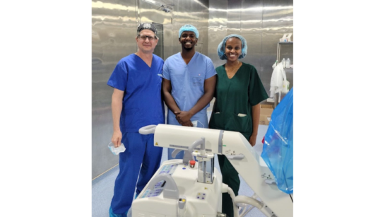 Mark St. Denis, with Gilbert and Isabelle, two members of the interventional radiology team in the Rwanda Military Hospital in Kigali.