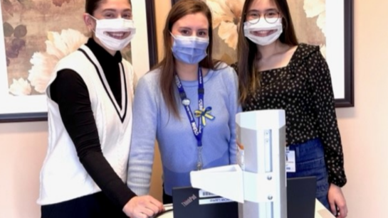 Olena Pankiw, (C), a speech-language pathologist in Toronto Rehab's Brain Rehab Program, with learners Gabrielle Dimech, (L), and Sophia Yang.