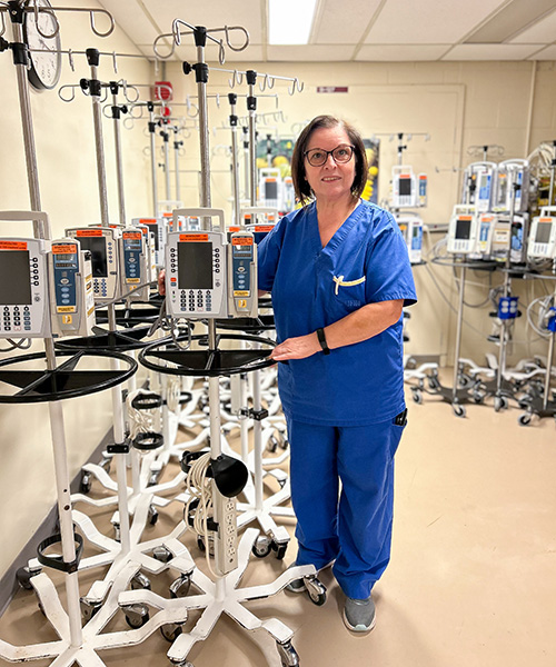 Fernanda Da Silva has been part of Support Services at UHN for 24 years. As a hospital assistant at Toronto Western Hospital, she transports patients, specimens and equipment, and now specializes in transporting infusion pumps like the ones pictured, across the site. (Photo: UHN)