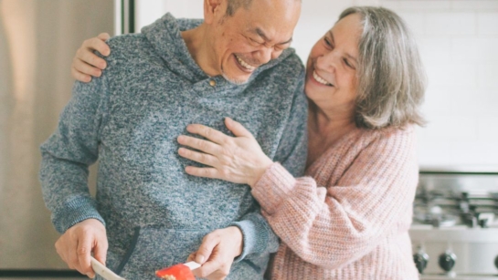 A couple in a kitchen making diabetes-friendly recipes