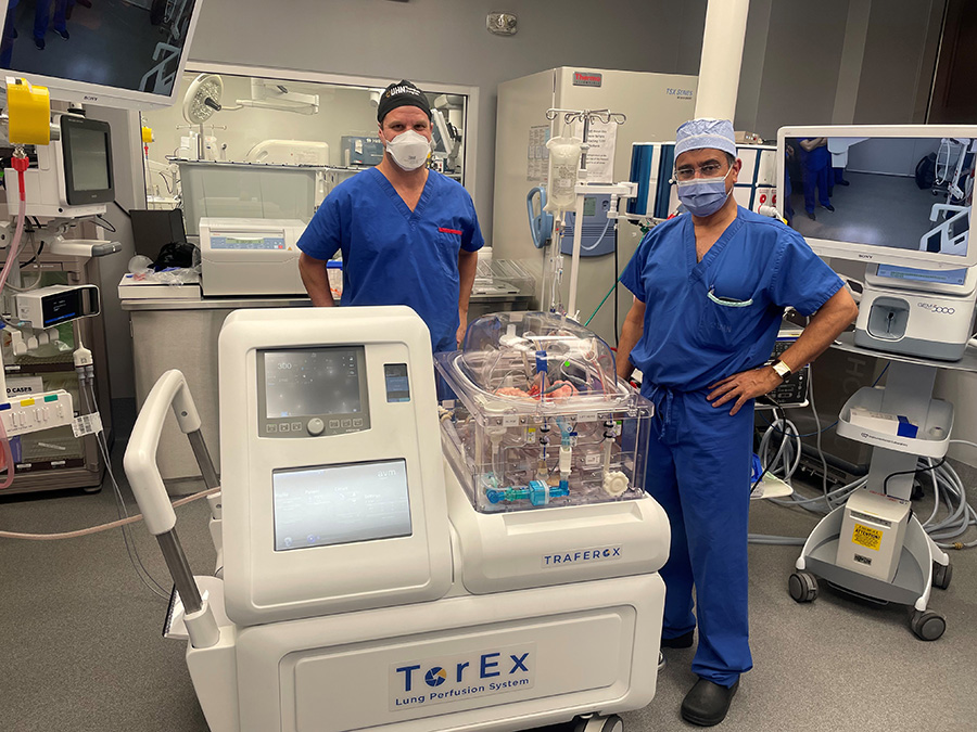 Drs. Marcelo Cypel, (L), and Shaf Keshavjee next to Ex-Vivo Lung Perfusion System