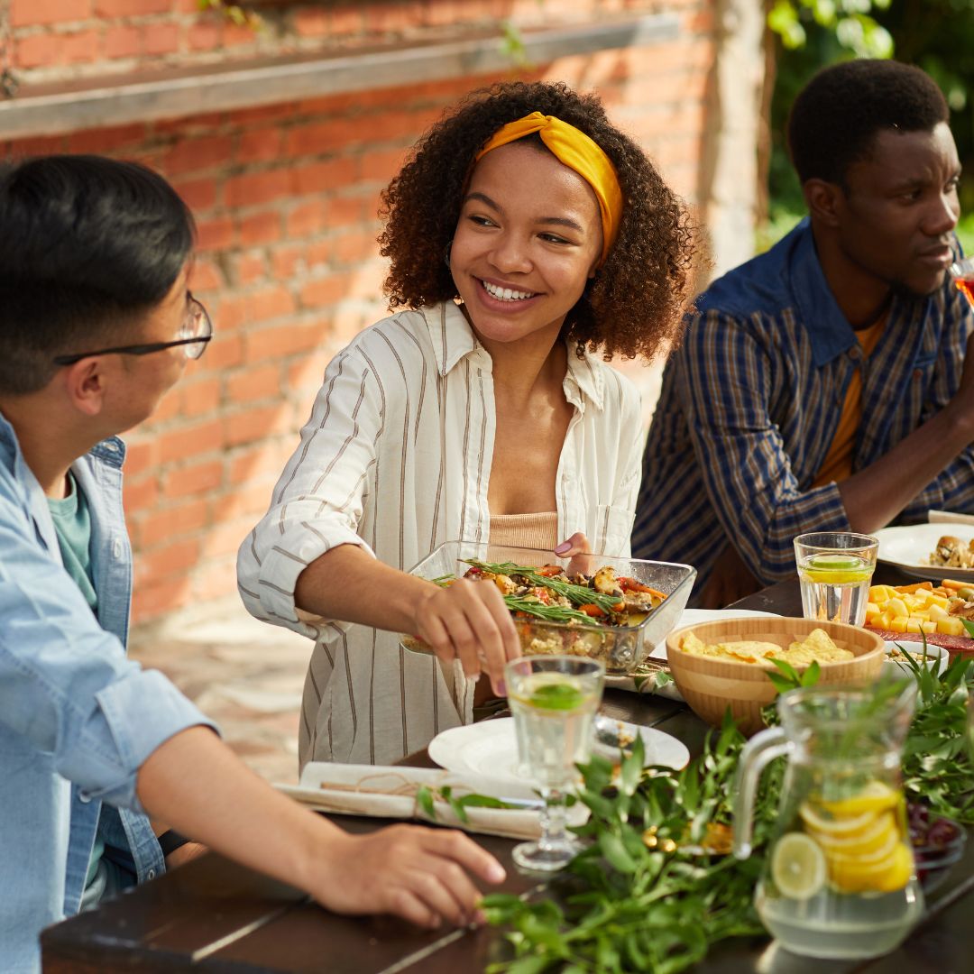 Friends enjoying dinner outdoors