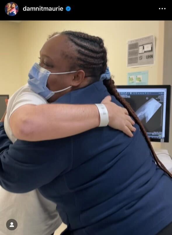 Maurie Sherman on Instagram with orthopedic technician, Stacy Baker, revealing Maurie’s x-ray where he is finally 95% healed.