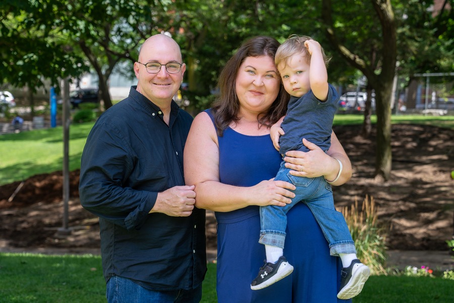 Ashley Comrie with her husband Kirk and their son, Clayton, outside of Toronto General Hospital. 