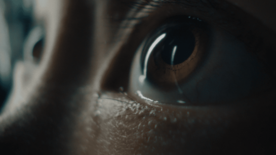 A closeup photo of an eye of a patient receiving vision care