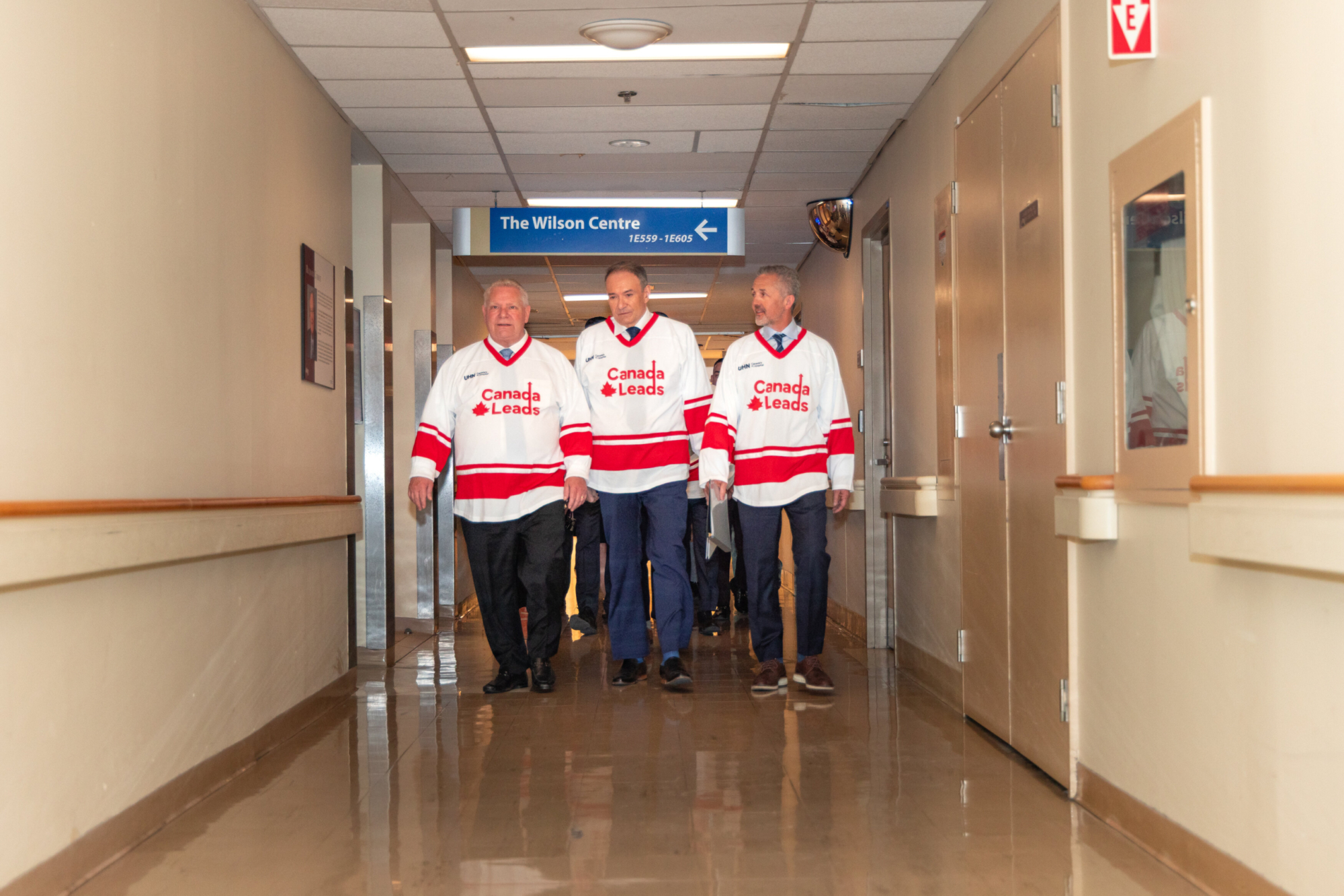 Doug Ford, Kevin Smith and Brad Wouters walking