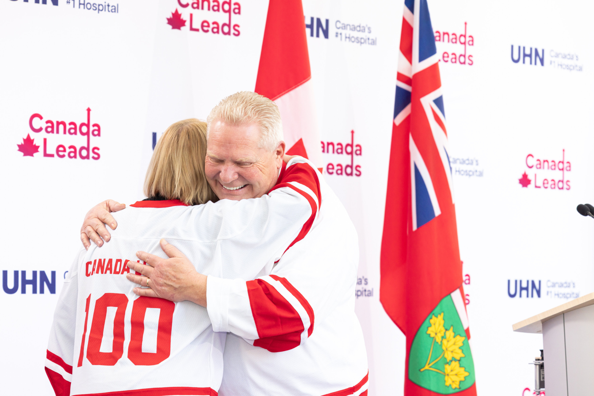 Doug Ford and Sylvia Jones embracing