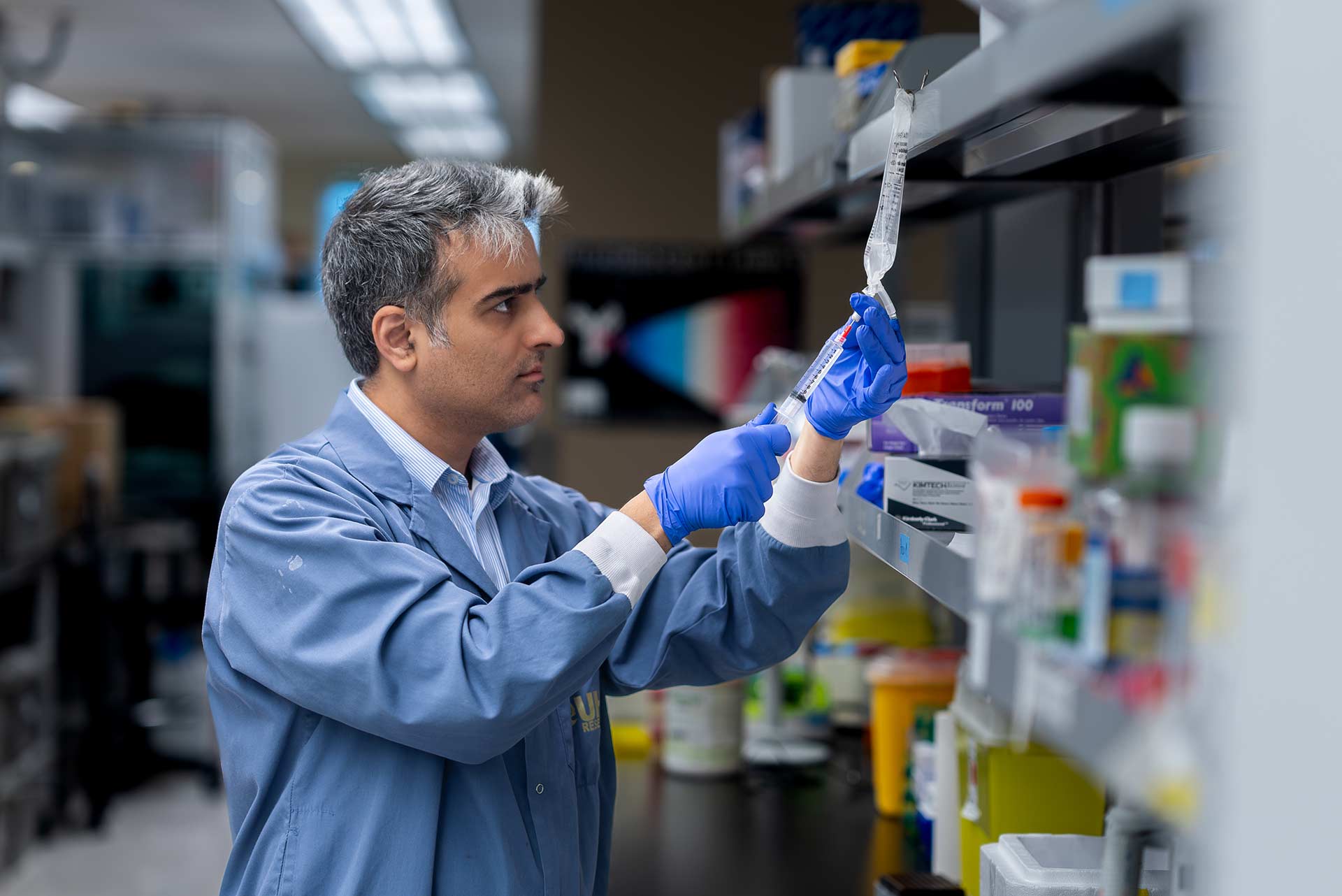 Image of a medical researcher working in the lab.