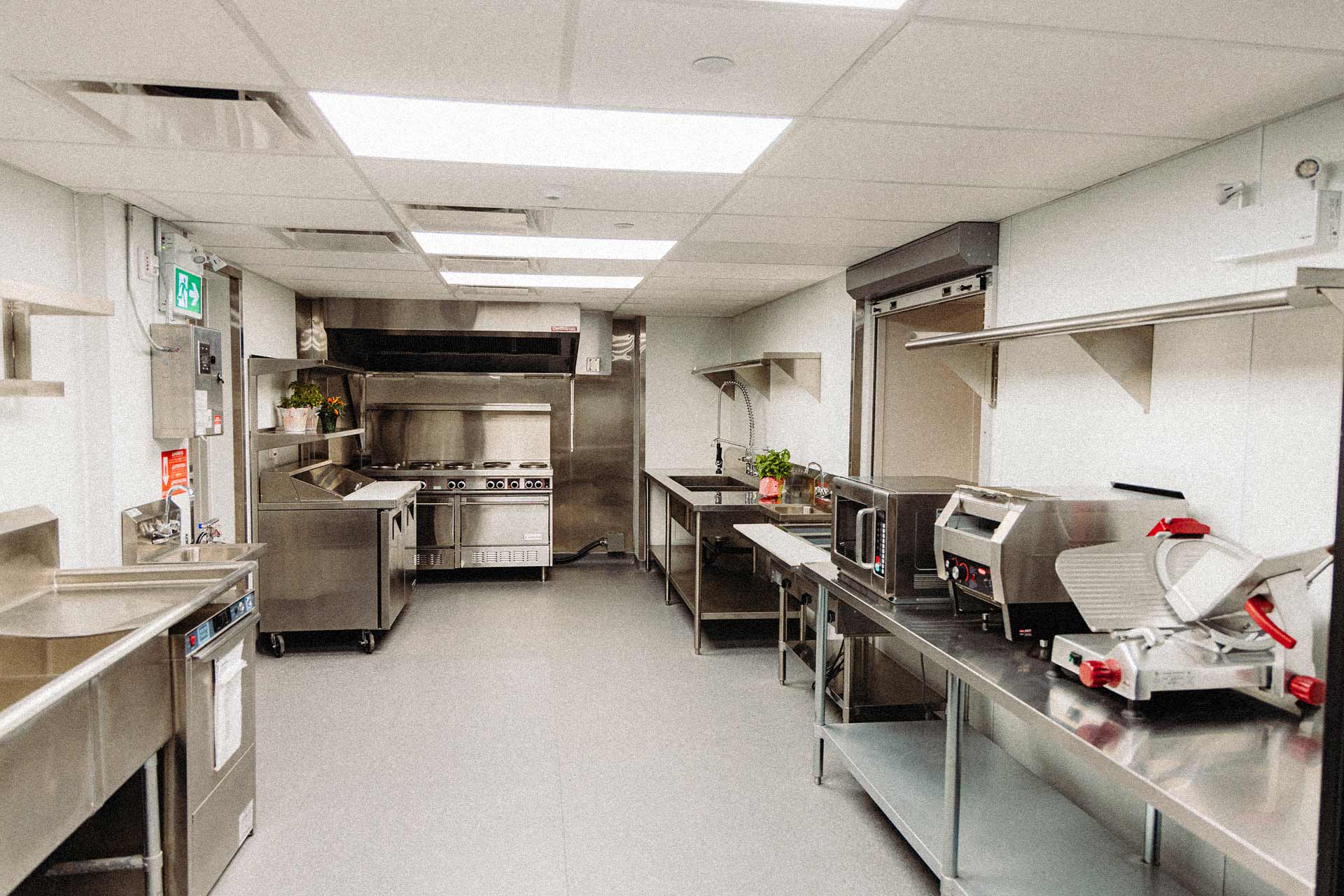 A kitchen with various appliances.