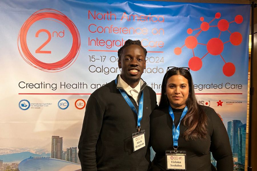 Adeyemi (Adeife) Akingbade, (L), a summer student at UHN's Sonshine Centre, and Vishma Sookdeo presented the Women's Post-Stroke Educational Toolkit at the North American Conference on Integrated Care last October in Calgary. (Photo: Courtesy Adeyemi (Adeife) Akingbade)