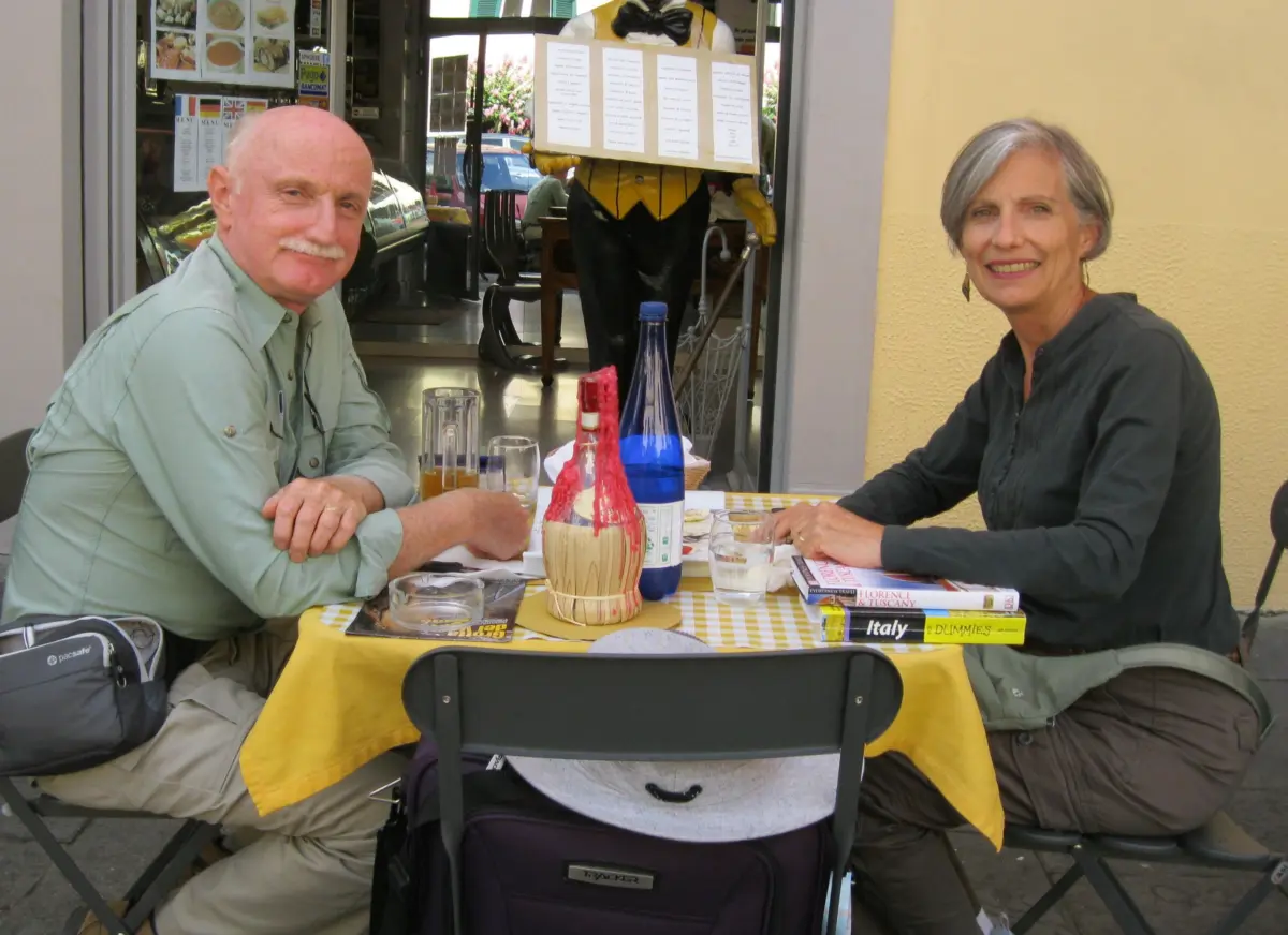 Mary Anne and David Peacock enjoying a meal together at a restaurant.