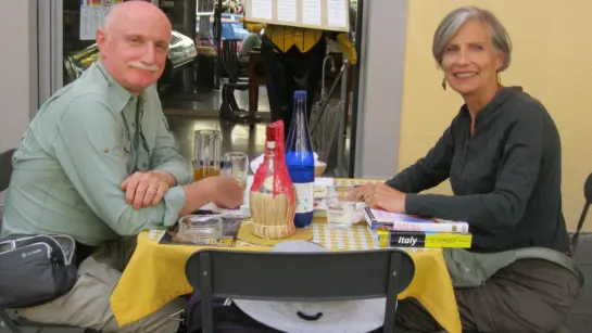 Mary Anne and David Peacock enjoying a meal together at a restaurant.
