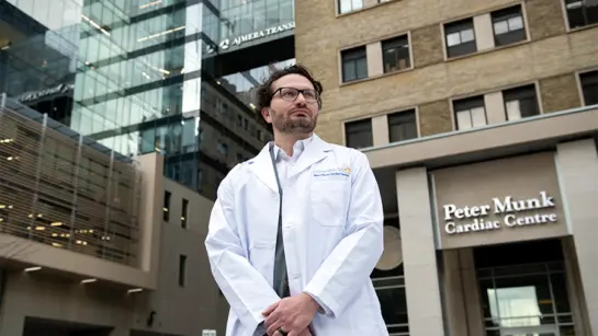 Dr. Seyed Alireza in front of UHN's Peter Munk Cardiac Centre