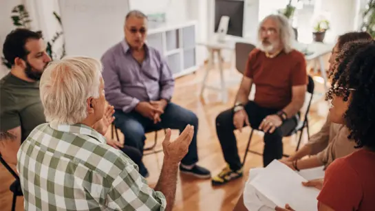 A stock image of a support group.