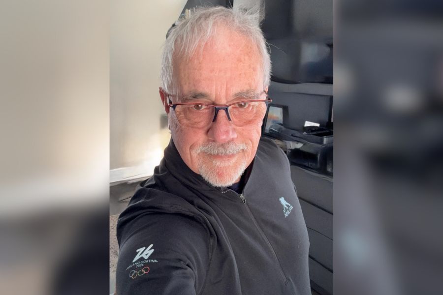 Dr. Paul Comper takes a selfie while wearing NHLPA jacket.