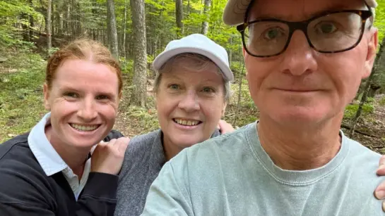 Richard Stephenson (right), with his wife, Mary Jane (centre) and daughter Erin pictured in a forest.