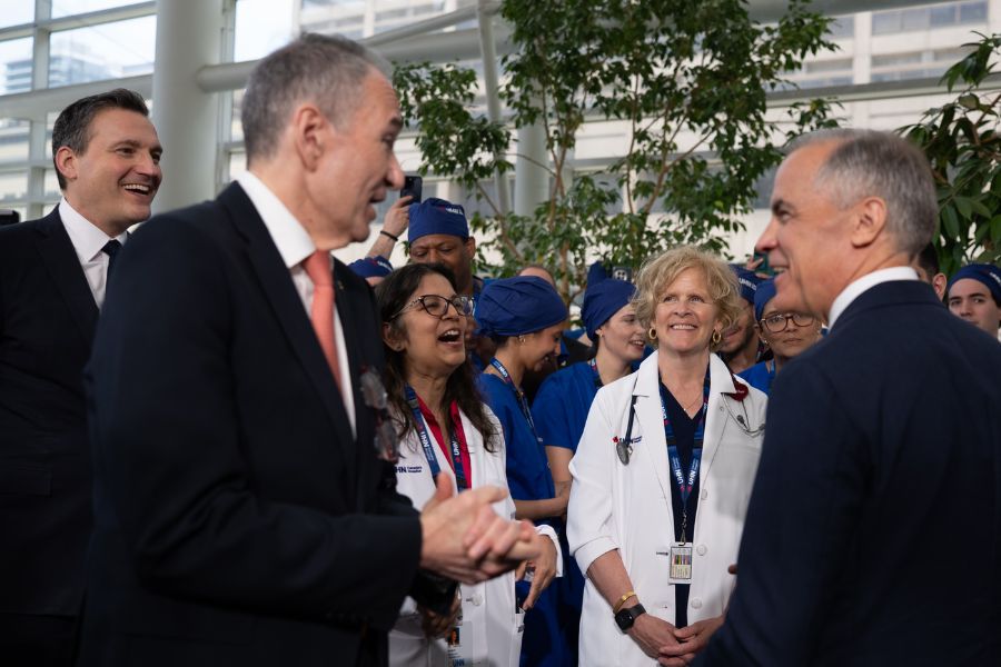 Mr. Mark Carney with Dr. Kevin Smith.