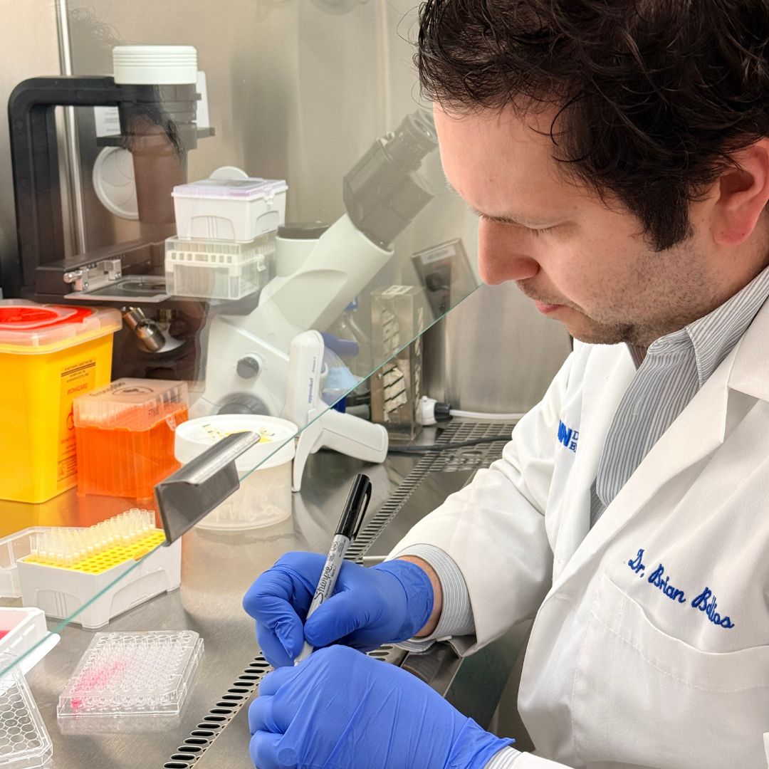 Dr. Brian Ballios working in the lab at UHN.